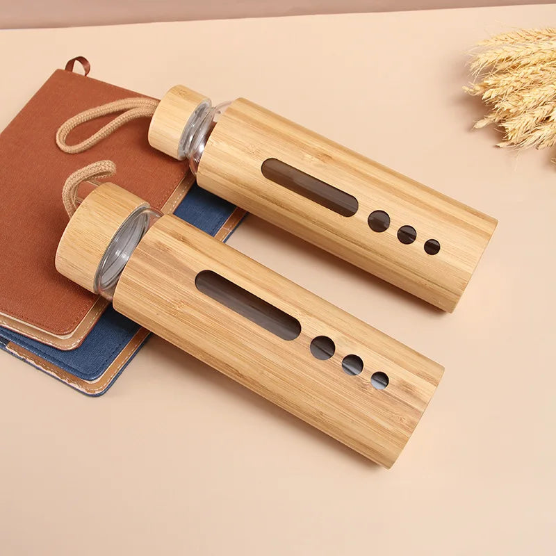 Eco Friendly 500ml Glass Water Bottle with Heat Proof Bamboo Sleeve