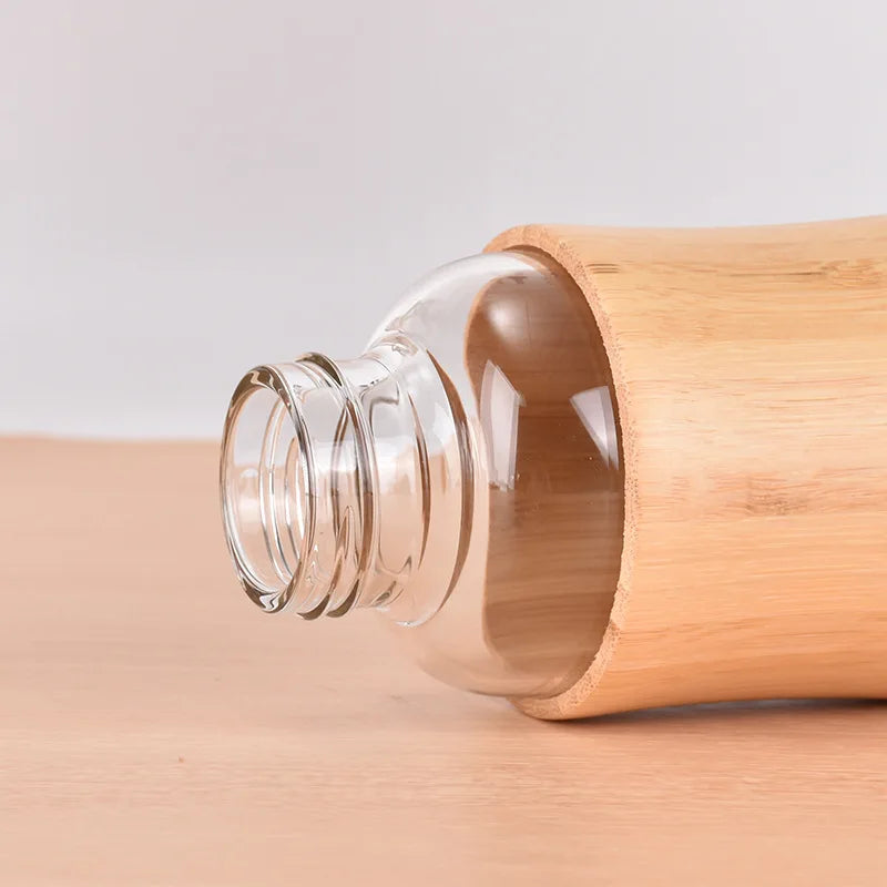 Eco Friendly 500ml Glass Water Bottle with Heat Proof Bamboo Sleeve